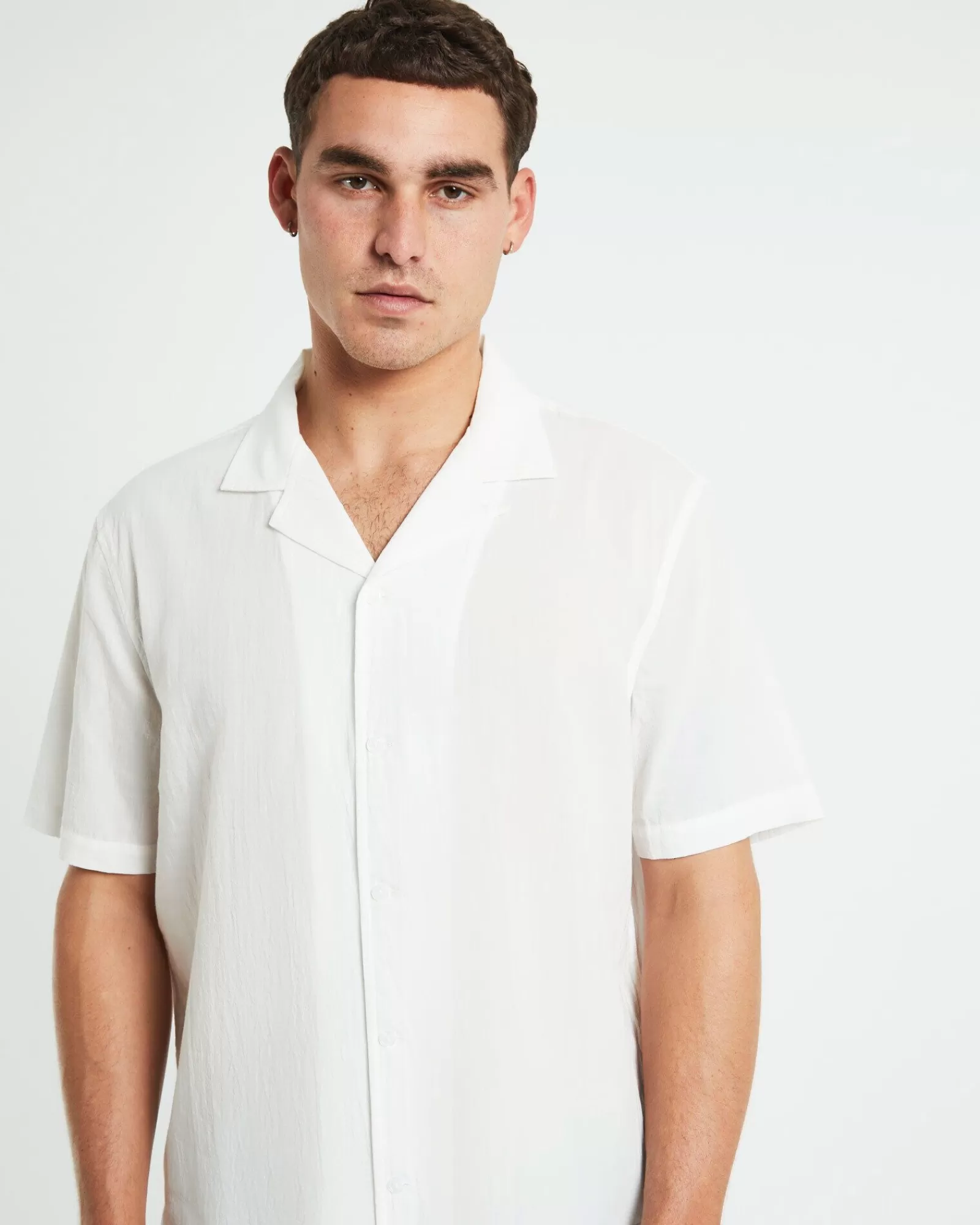 Maglietta Elegante Manica Corta Heggie di ARVUST - Bianco Puro per Vacanze in Stile Resort, Estate 2024